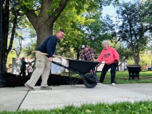 Rotarians spreading mulch