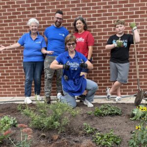 Pat with group, planting garden at Butterfly Ridge Elementary School