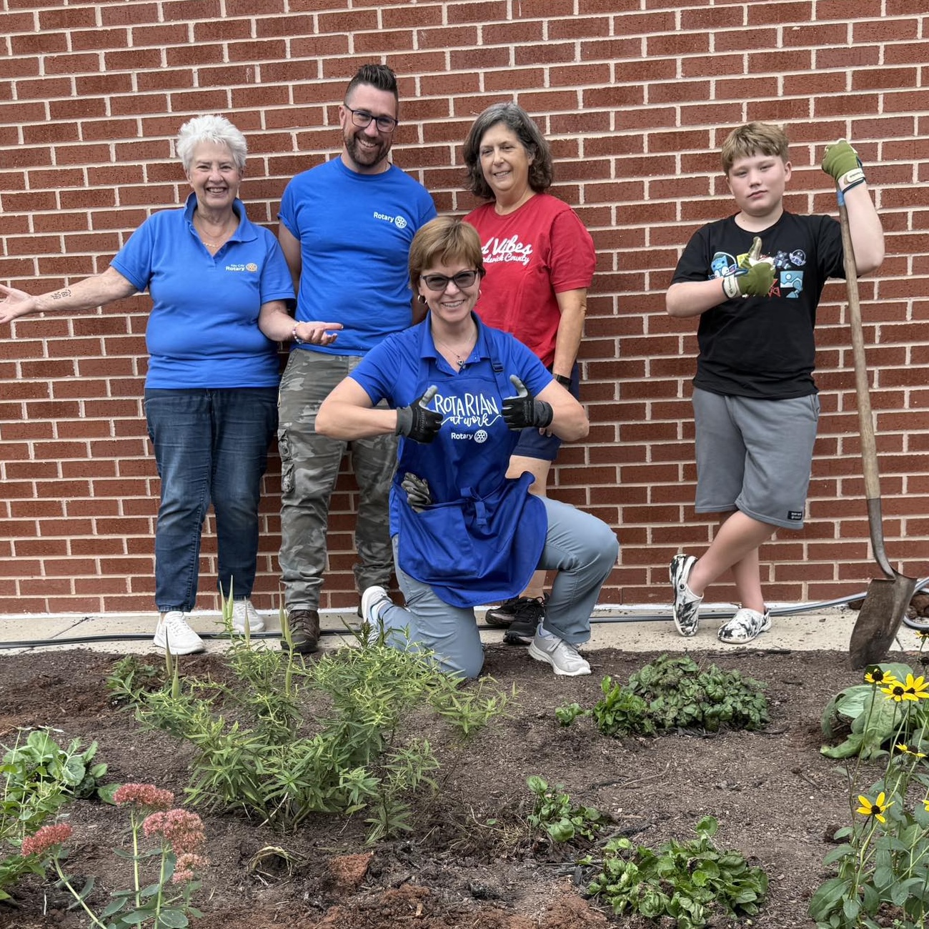 Pat with group, planting garden at Butterfly Ridge Elementary School